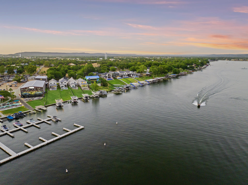 Hill Country Custom Homebuilder highlighting the best neighborhoods to build in 2026 including Boot Ranch, The Drace, Summit Rock, Travis Club, and Spanish Oaks.